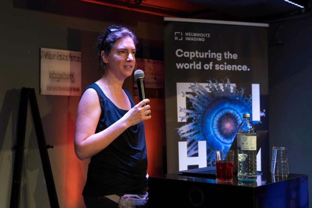 Dagmar Kainmüller, HI spokesperson, introducing the winners of the Best Scientific Image Contest 2024