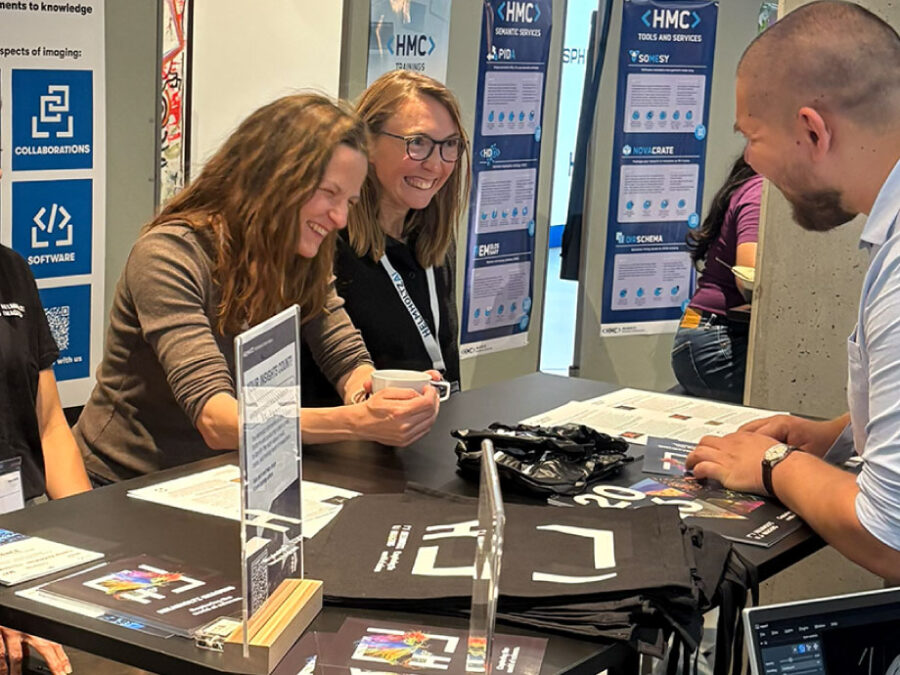 Group photo of the Helmholtz Imaging team at their booth at HAICON26